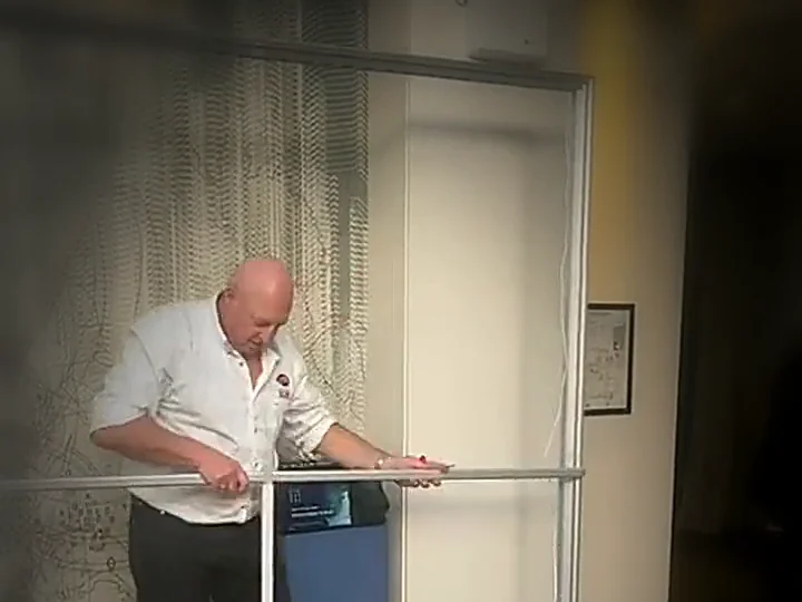 Roy Kowarski of Out There Branding fitting the crossbar of a FABriX aluminium frame by hand